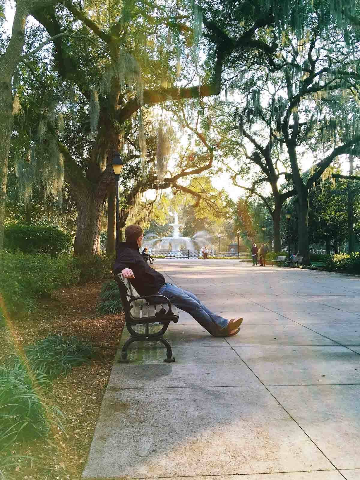 Man sitting on a bench.